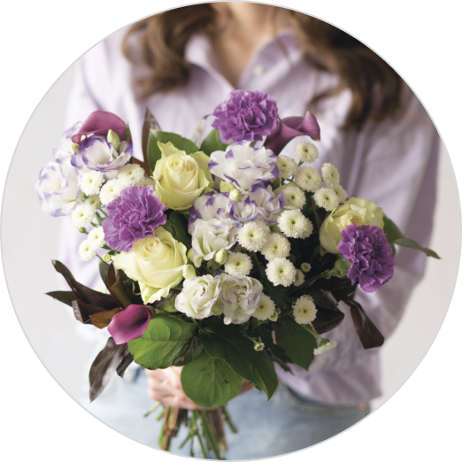 Woman holding a bouquet of flowers